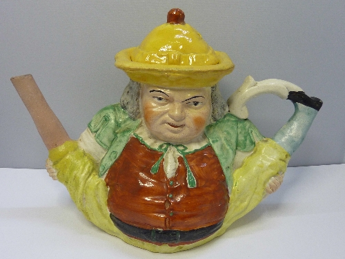 A 19th Century Staffordshire Toby teapot, height 20cms, a/f