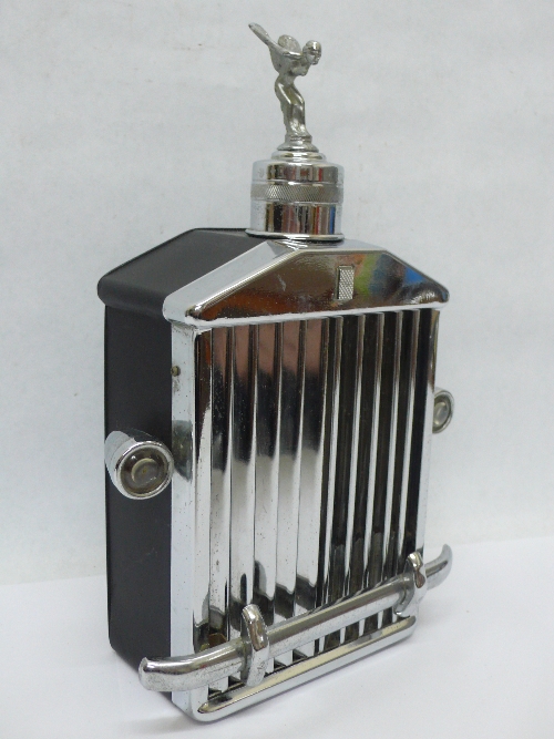 A novelty musical decanter in the form of a Rolls Royce radiator