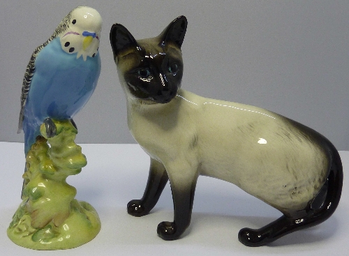 A Beswick Budgie, model number 1217, height 18cms and a Siamese Cat standing, model number 1894,