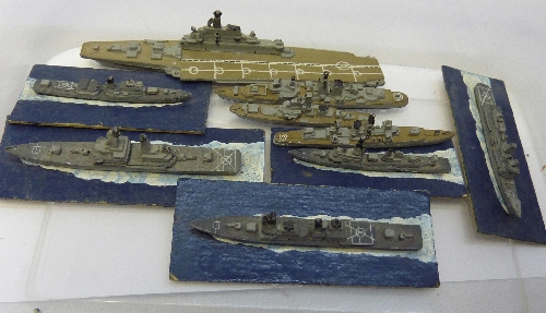 Eight war gaming scale model warships