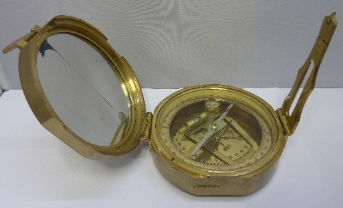 A modern brass compass