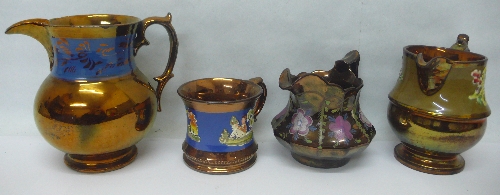 Four 19th Century copper lustre jugs
