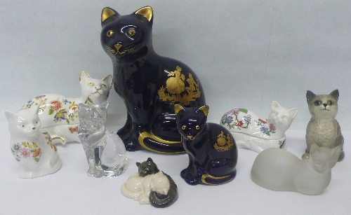 Two Royal Doulton models of cats and seven other cats