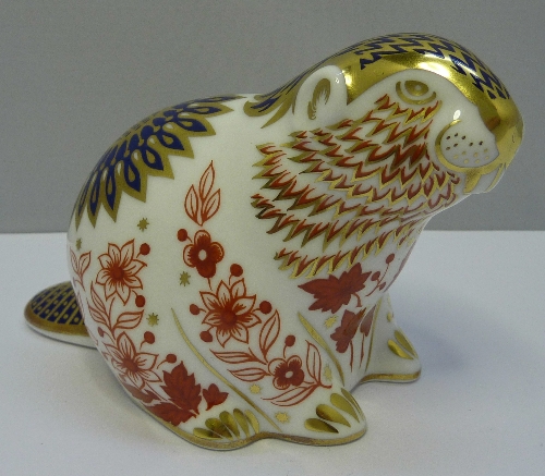 A Royal Crown Derby paperweight, Beaver, with gold stopper and box