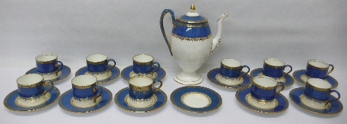 A Wedgwood part coffee service decorated in powder blue with gilt edging, comprising coffee pot,