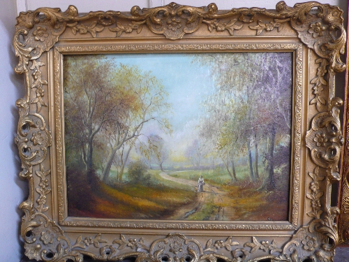 English School, landscape with figure on a path, oil on canvas, framed