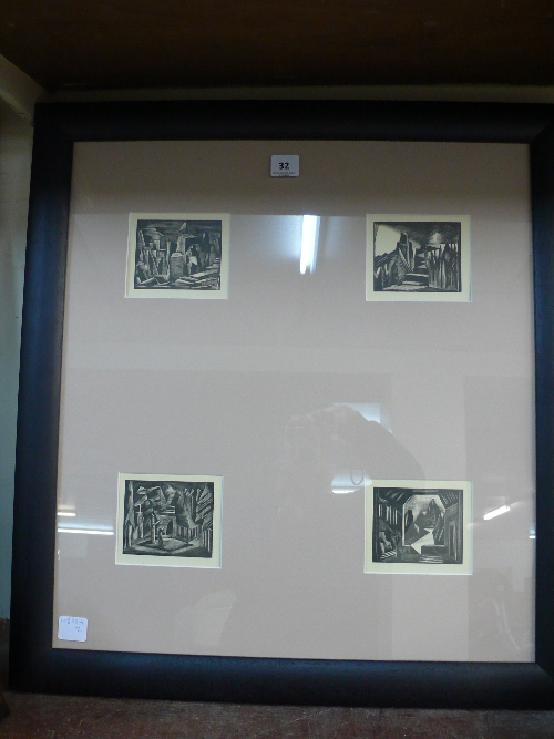 A set of four Paul Nash wood engravings, framed