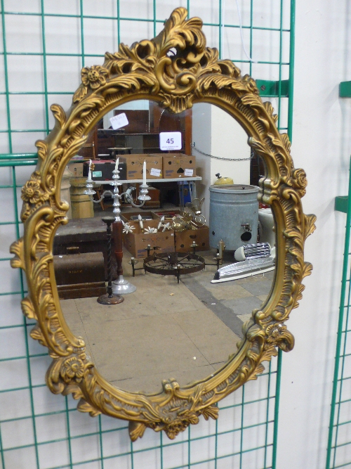 A Rococo style gilt frame mirror