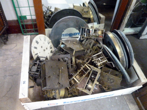 A box of assorted clock parts