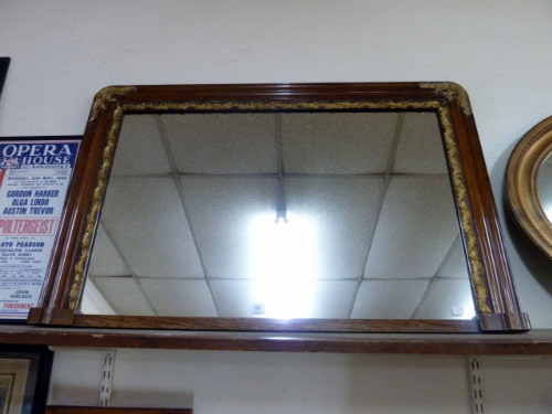 A Victorian stained pine and parcel gilt overmantel mirror