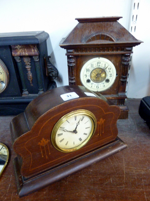 A late 19th century continental oak mantel clock and an Edward VII mahogany mantel clock