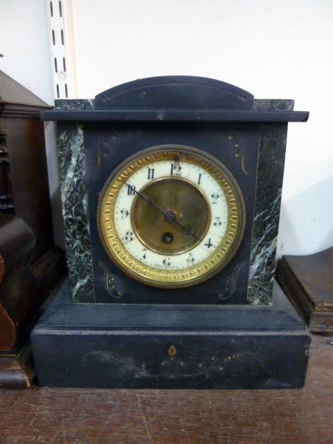 A 19th century slate mantel clock