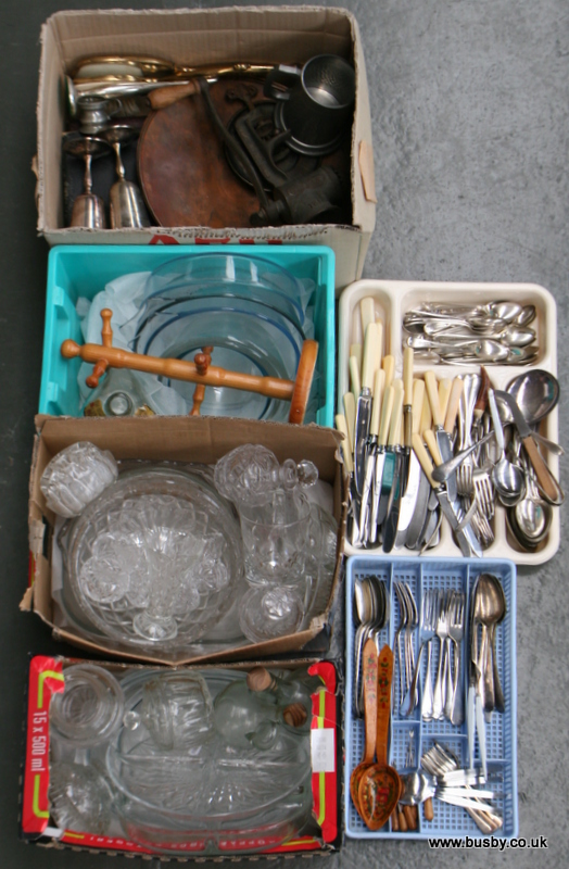 A selection of general kitchenalia including flatware, glass, cast iron grinder, etc.