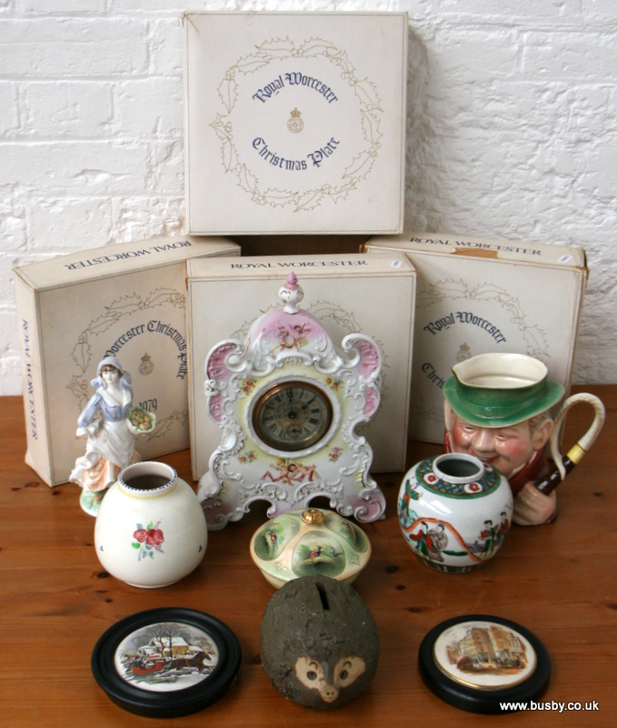 Assorted ceramics to include an early 20th century continental porcelain clock, pot lids, a powder