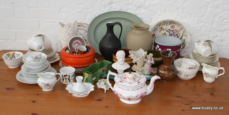 A collection of white floral China including three tea sets and  a Sunderland lustre tea pot, plus