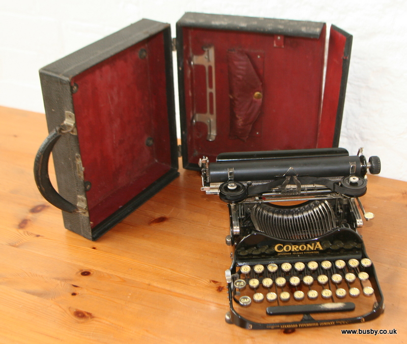 A cased Corona number three folding typewriter.