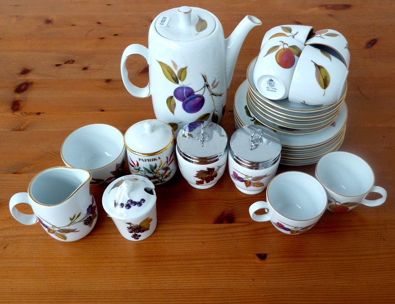 An Evesham pattern Royal Worcester six setting breakfast coffee set, a pair of matching egg