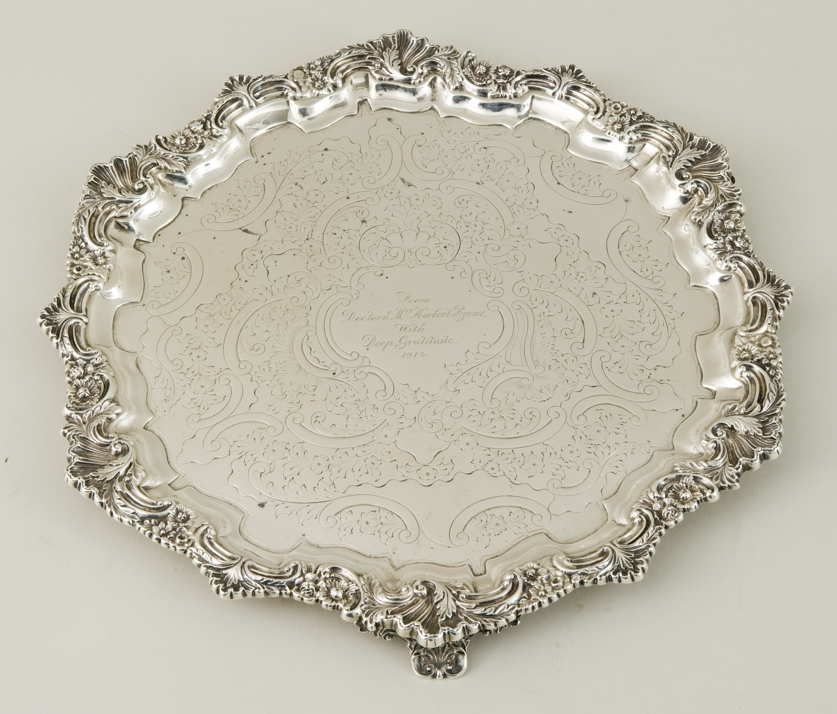 A Large Victorian rococo revival hallmarked silver salver, London 1897 by Thomas Bradbury & Sons,