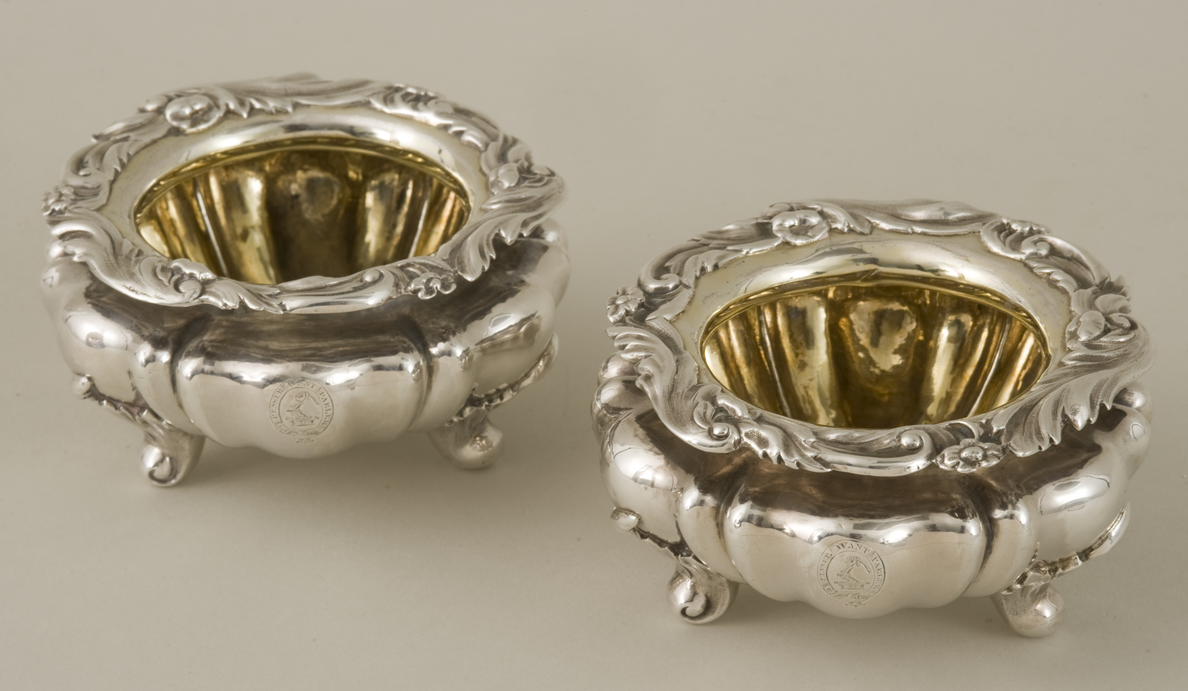 A pair of William IV hallmarked silver serpentine cauldron salts, London 1834 by John Tapley, the