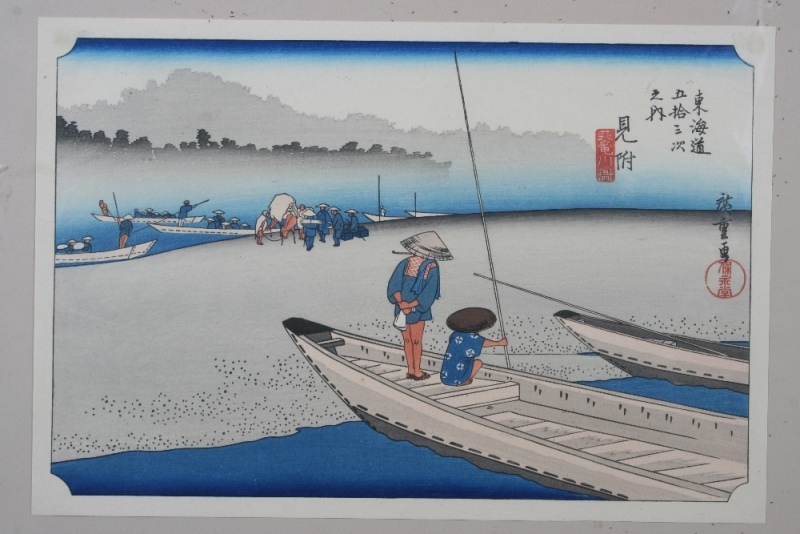 A Japanese watercolour, depicting figures in fishing boats on a fore shore; and a companion