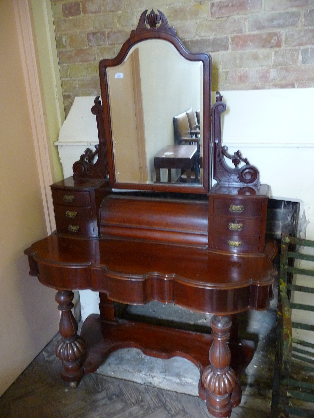 A Victorian Mahogany mirrored dressing table.