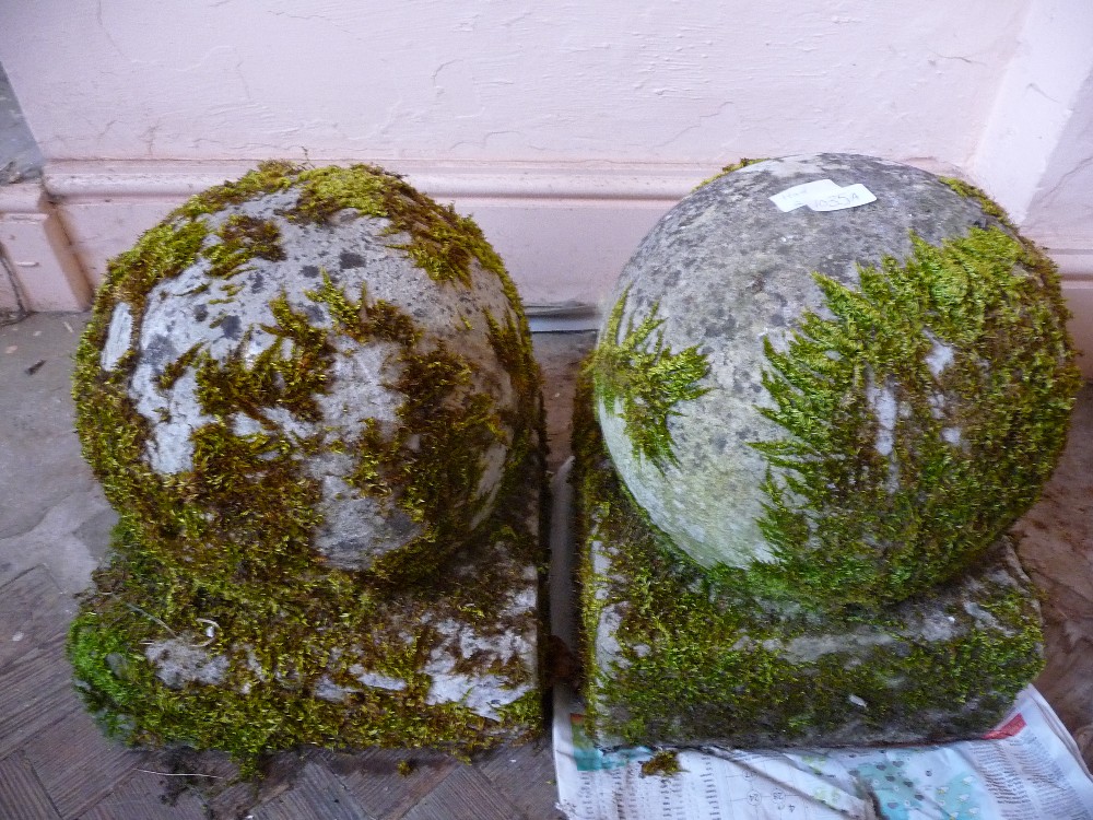 A pair of concrete balls.