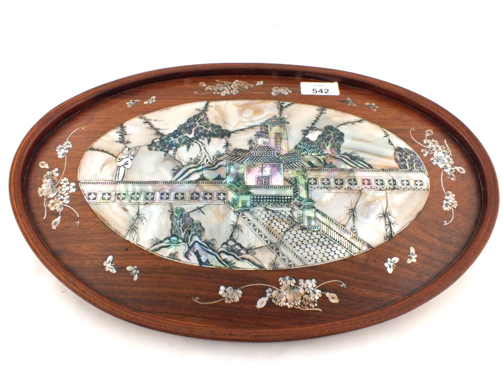 A Japanese oval plaque with Mother of Pearl house and landscape decoration, diameter 16"