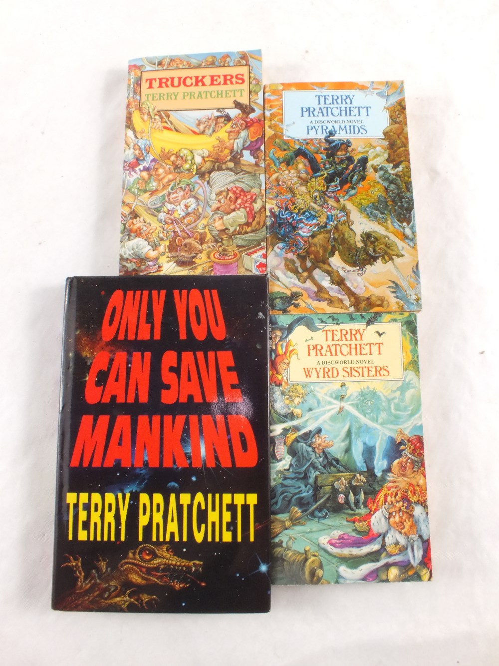 Terry Pratchett, Only You Can Save Mankind and three paperbacks, all signed copies