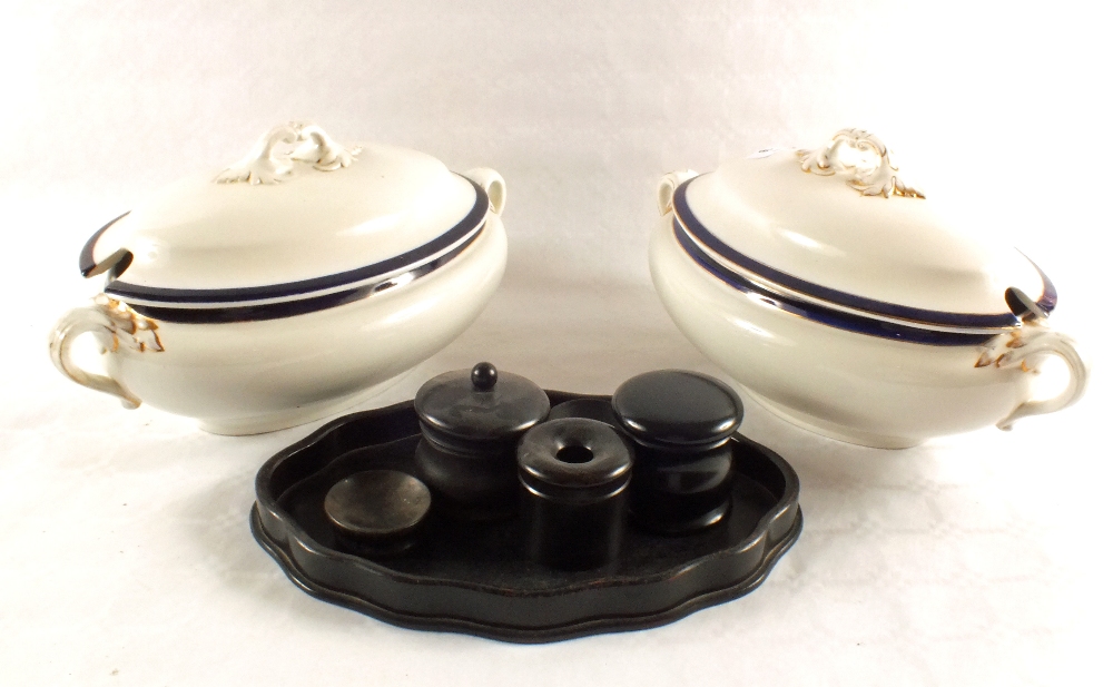 A pair of Bleu de Roi soup tureens and an ebony dressing table set