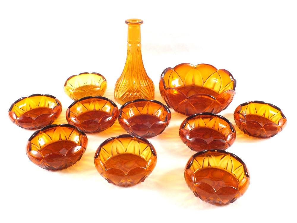 A quantity of various amber glass