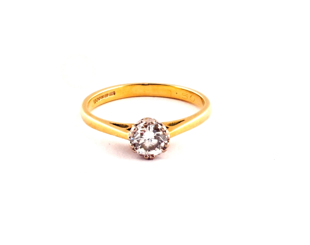 An 18ct yellow Gold solitaire Diamond ring (1/2 carat)