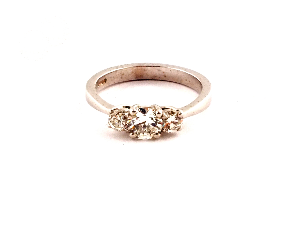 An 18ct white Gold three stone Diamond ring