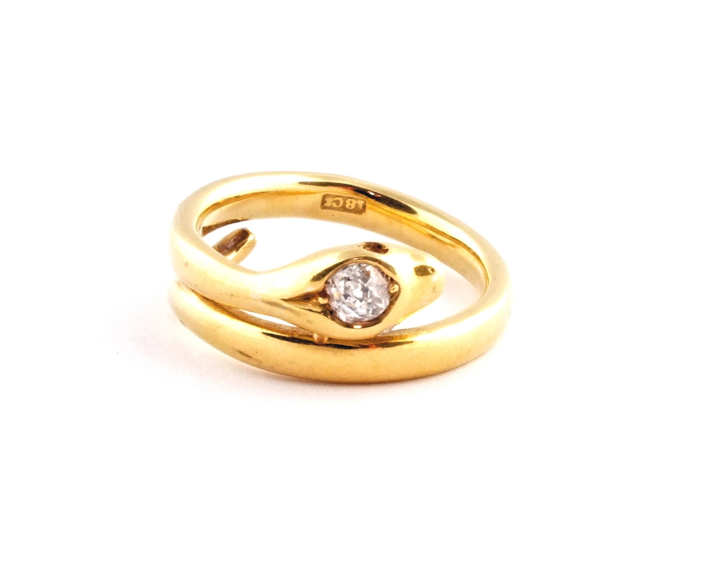 An 18ct Gold Diamond snake ring, size N