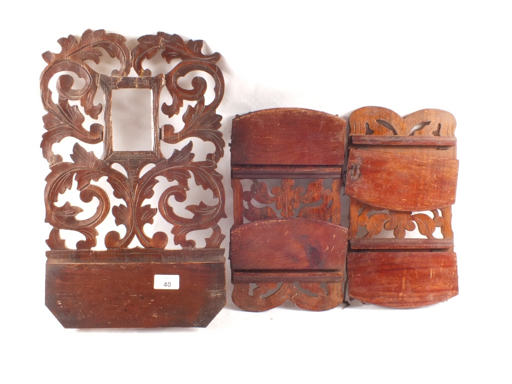 A Victorian family bible and three carved Pine wall brackets