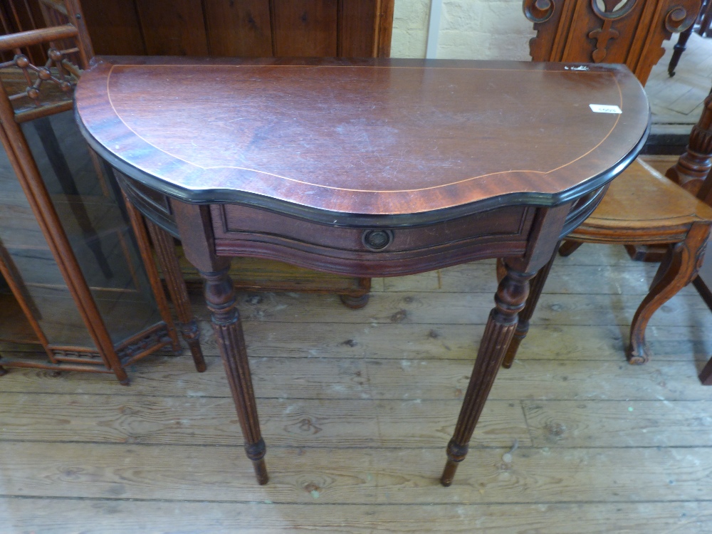 A single drawer reproduction hall table