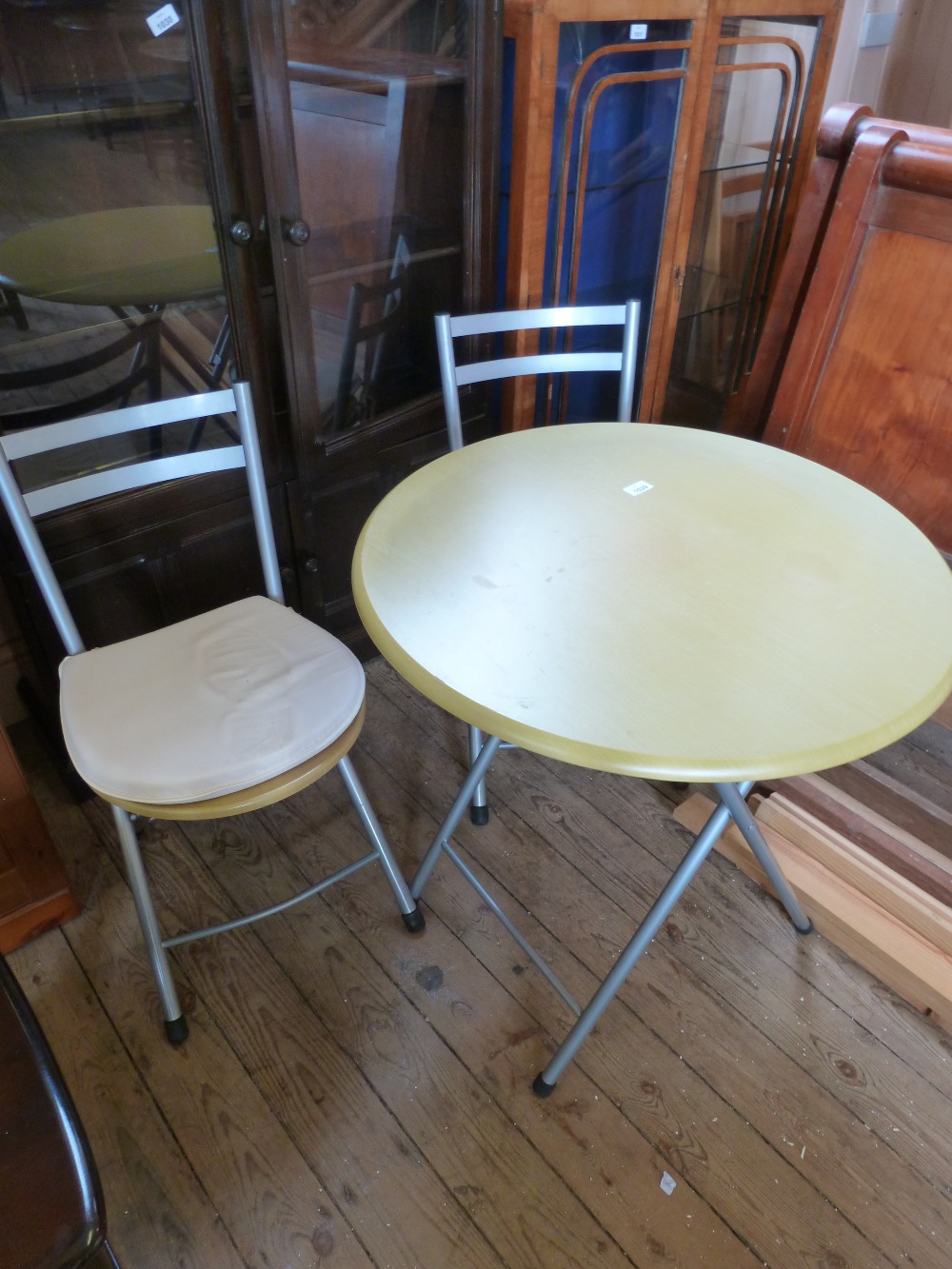 A small kitchen table and two chairs