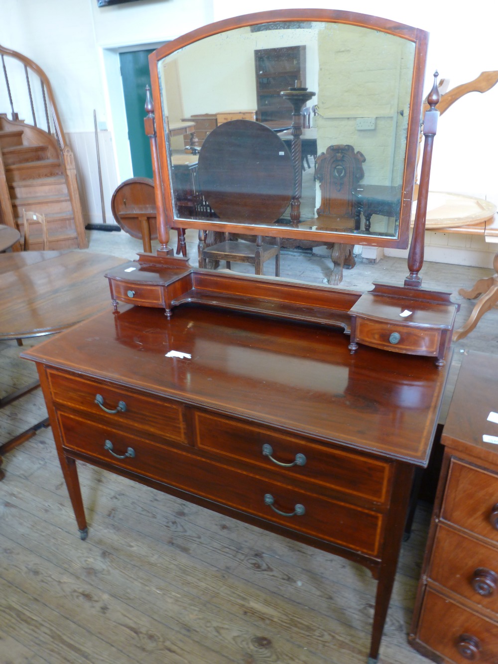 An Edwardian inlaid and cross banded dressing table