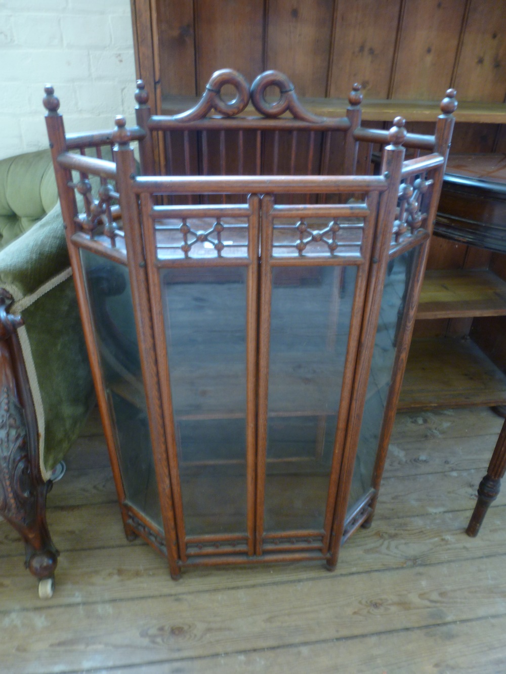 A small glazed floor standing Oak display cabinet