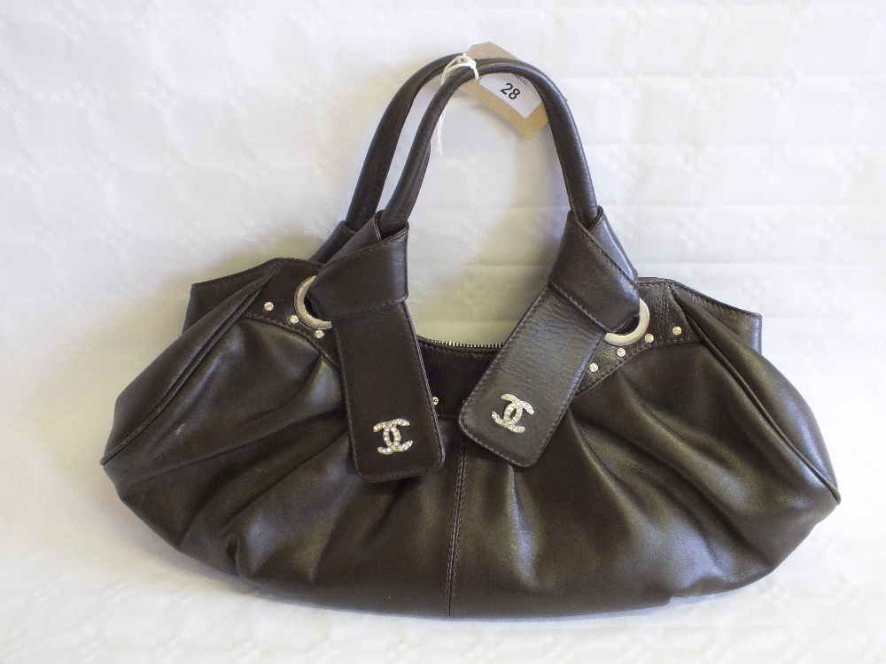 A Chanel style leather handbag