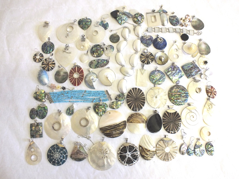 A large quantity of shell and Silver jewellery