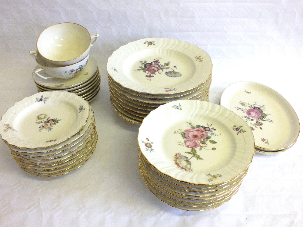 A fifty seven piece Royal Copenhagen dinner set with rose and floral painting