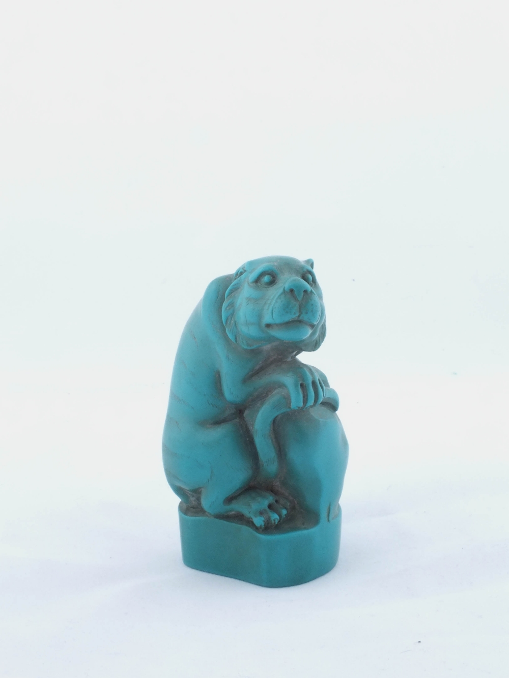 A Chinese Turquoise coloured carving of a wild cat