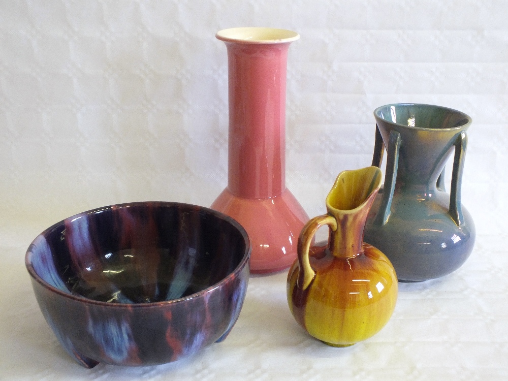 An Ault pink glazed vase and three other pieces of high glazed pottery, including Linthorpe jug (