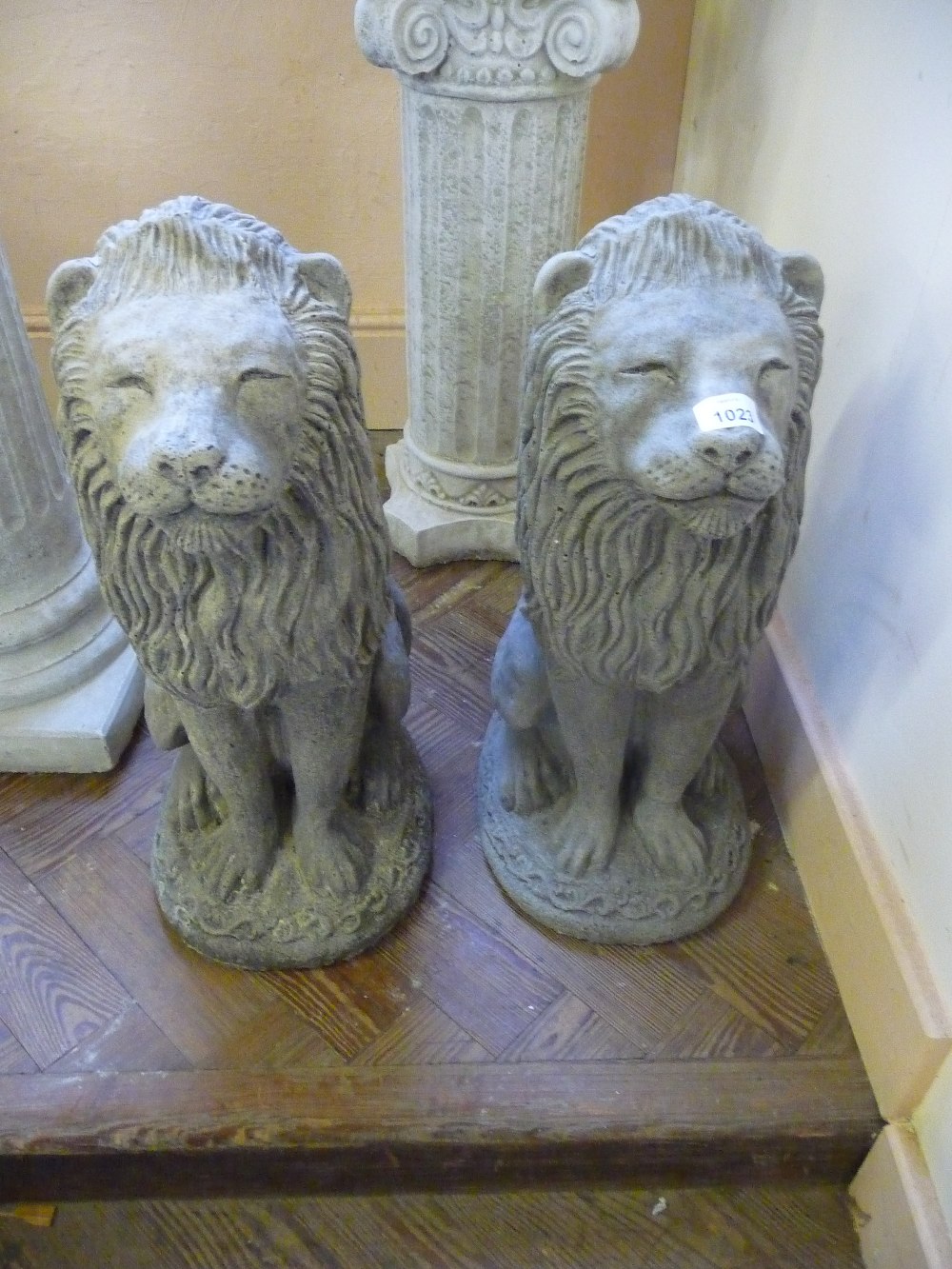 Two large concrete lions