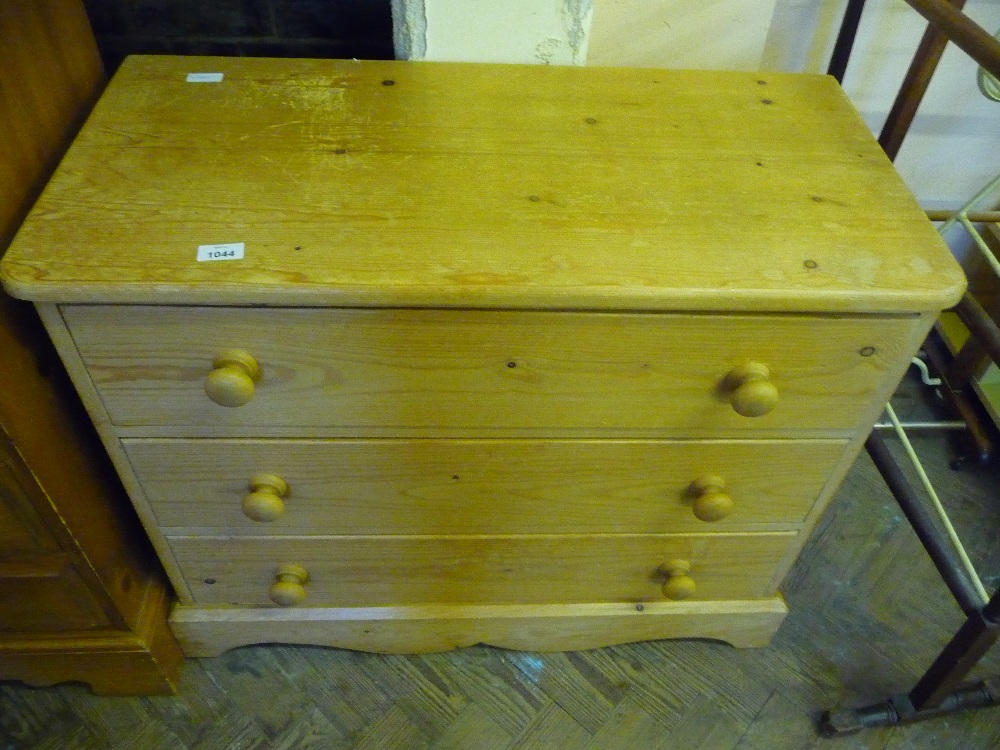 A Pine three drawer chest of drawers