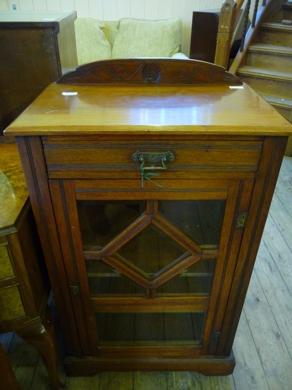 A Victorian Mahogany glazed music cabinet