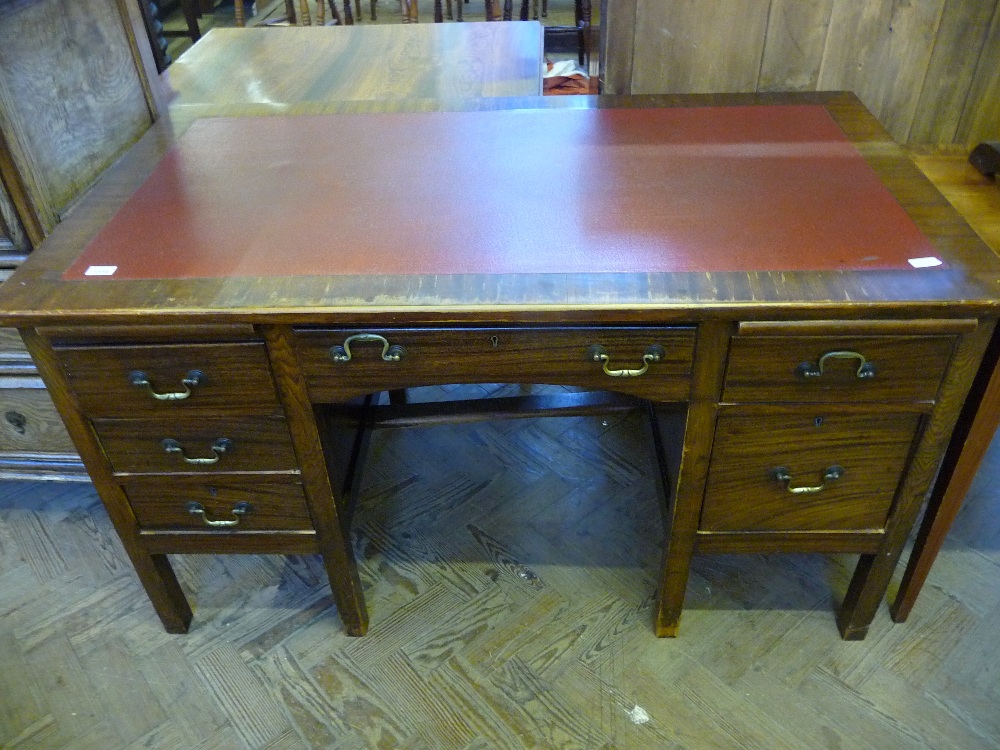 A six drawer pedestal desk