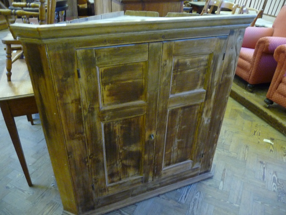 A Pine hanging corner cupboard