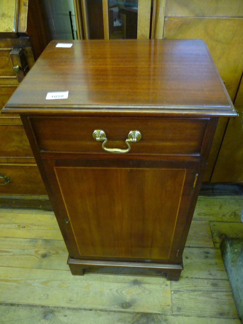 A reproduction Mahogany inlaid beside cabinet