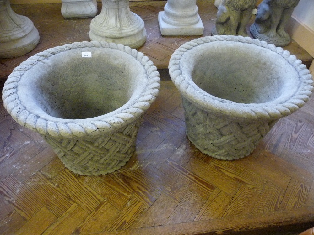 Two concrete lattice tub planters